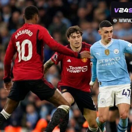 City Crushes United Dreams, Extends Unbeaten Run (Image of Man City players celebrating a goal against Man United)